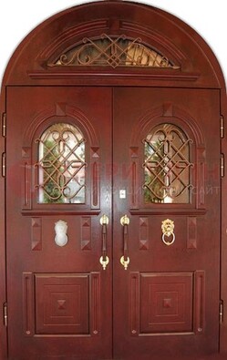 Стальная арочная дверь со стеклом и ковкой ДА-30 в дом из кирпича в Видном