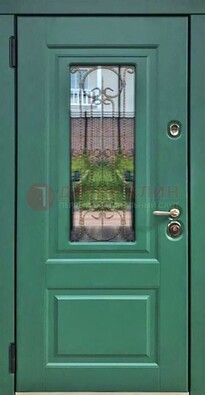 Зеленая металлическая дверь со стеклом и ковкой ДСК-113 в Видном